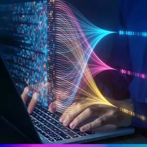 Pessoa utilizando notebook com visualiza&ccedil;&atilde;o digital colorida de dados e conex&otilde;es representando o uso da intelig&ecirc;ncia artificial no marketing digital para an&aacute;lise, automa&ccedil;&atilde;o e otimiza&ccedil;&atilde;o de campanhas.