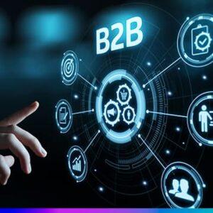 Mão interagindo com interface digital futurista com o termo B2B e ícones que representam negócios, marketing e tecnologia empresarial.